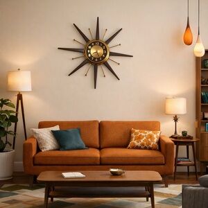 Mid century modern starburst clock made by United clock company in USA.